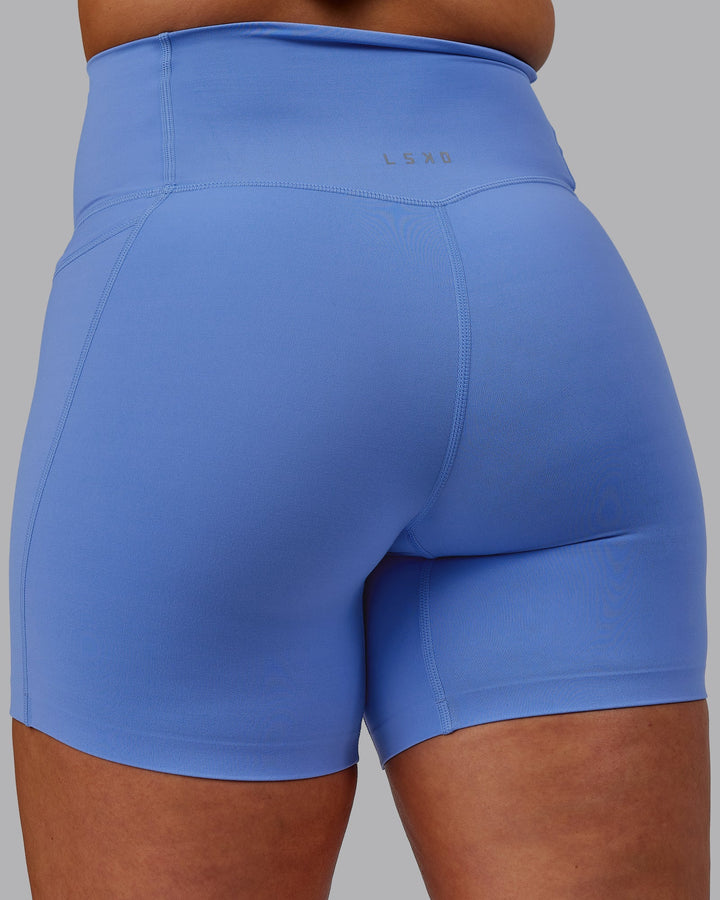 Woman wearing Elixir Mid-Length Shorts with Pockets - Ultramarine
