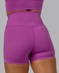 Woman wearing Elixir Ultra High-Rise 4" Short - Orchid