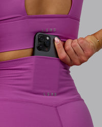 Woman wearing Elixir Ultra High-Rise 4" Short - Orchid