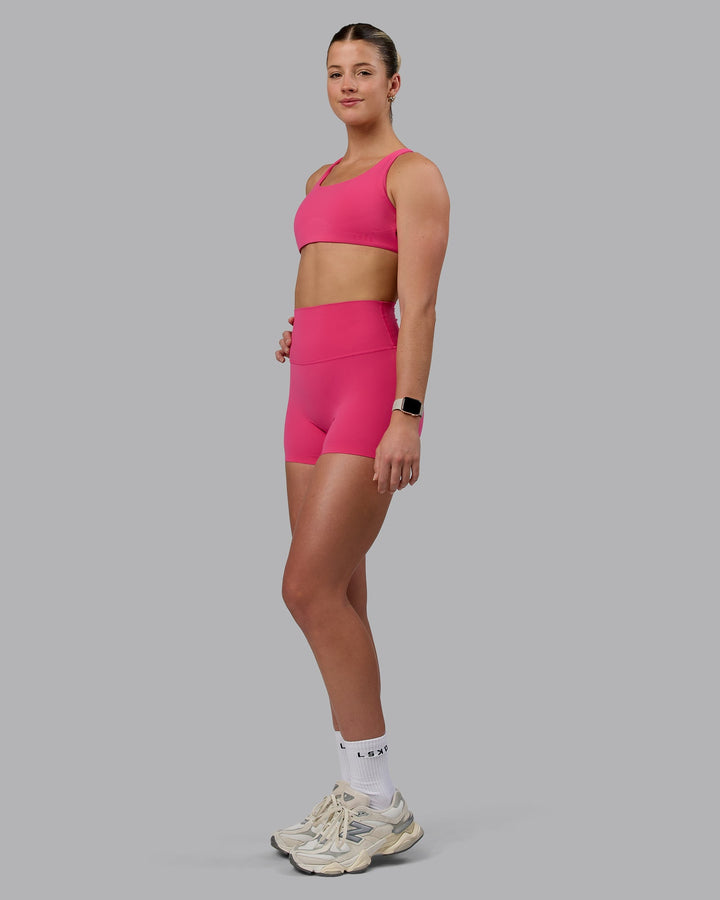 Woman wearing Elixir X-Short Tights - Pink Flash
