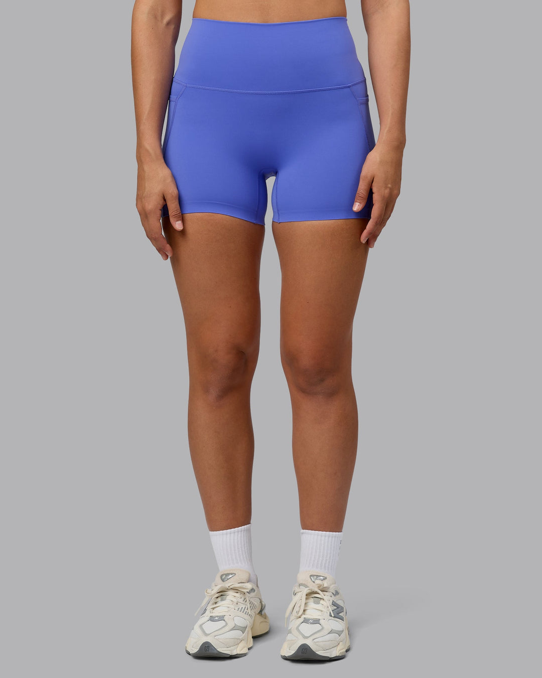 Woman wearing Elixir X-Short Tights With Pockets - Baja Blue