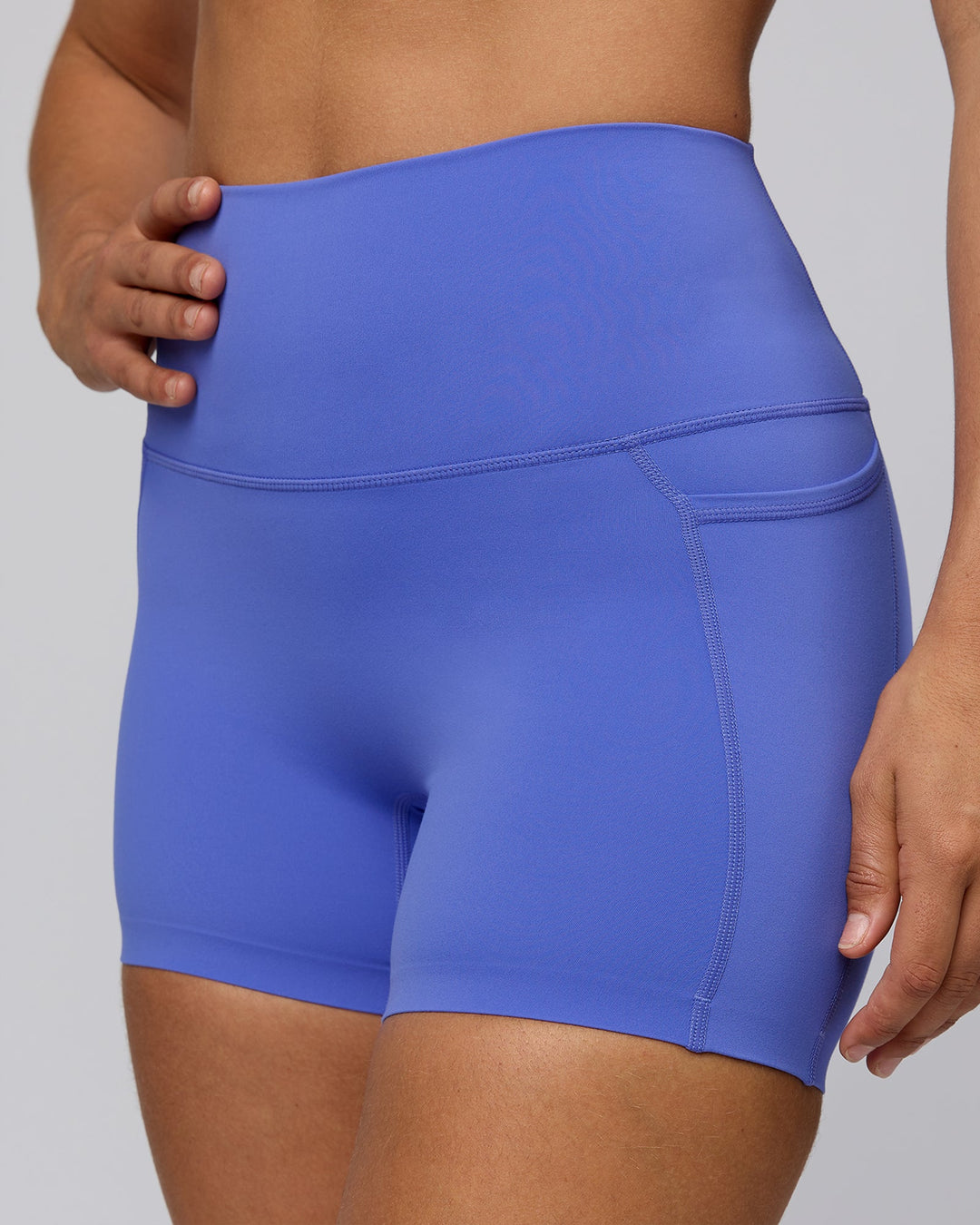 Woman wearing Elixir X-Short Tights With Pockets - Baja Blue