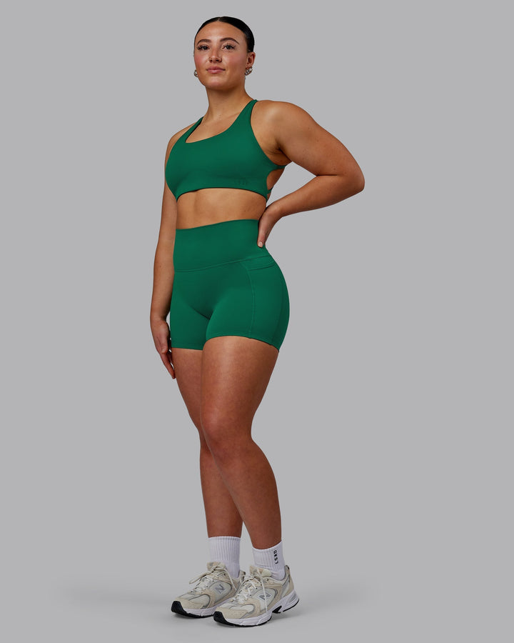 Woman wearing Elixir X-Short Tights With Pockets - Malachite
