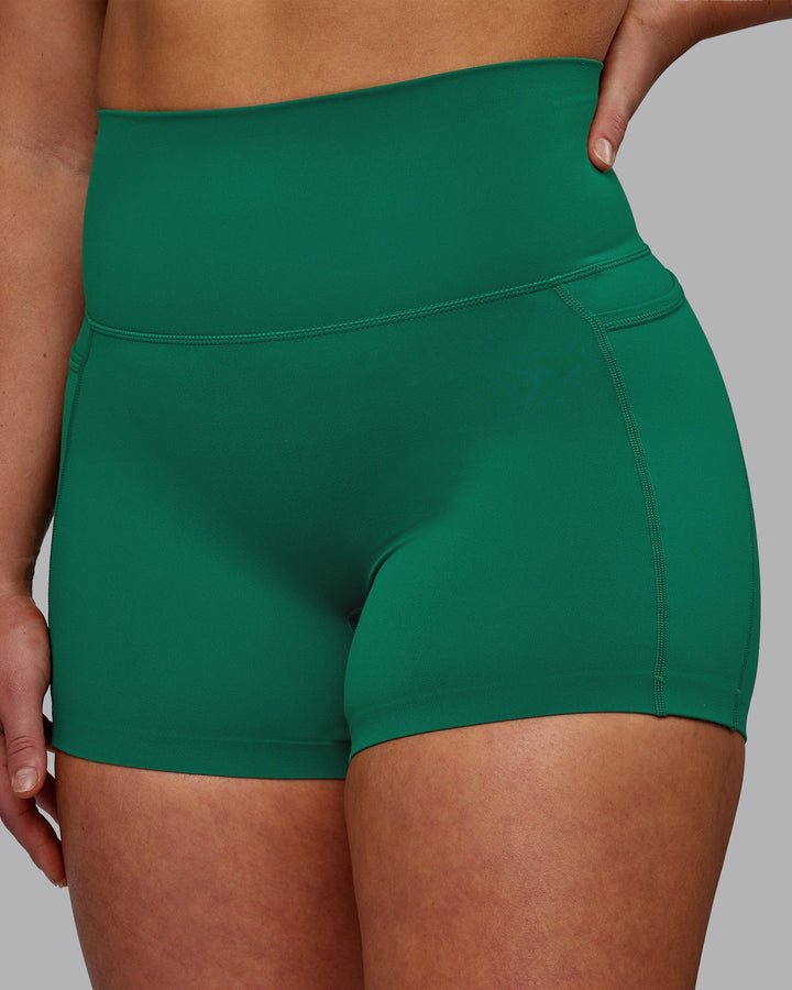 Woman wearing Elixir X-Short Tights With Pockets - Malachite
