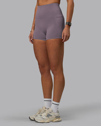 Woman wearing Elixir Ultra High-Rise 4" Short Pockets - Purple Sage