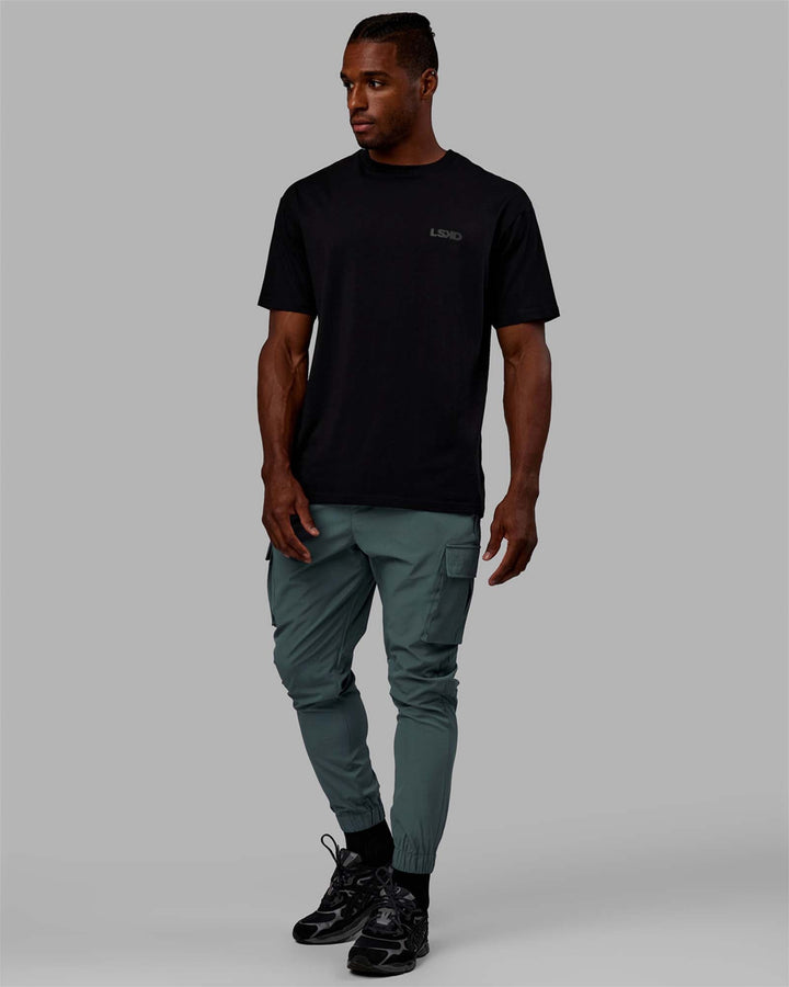 Man wearing Energy Stretch Performance Cargo Joggers - Storm
