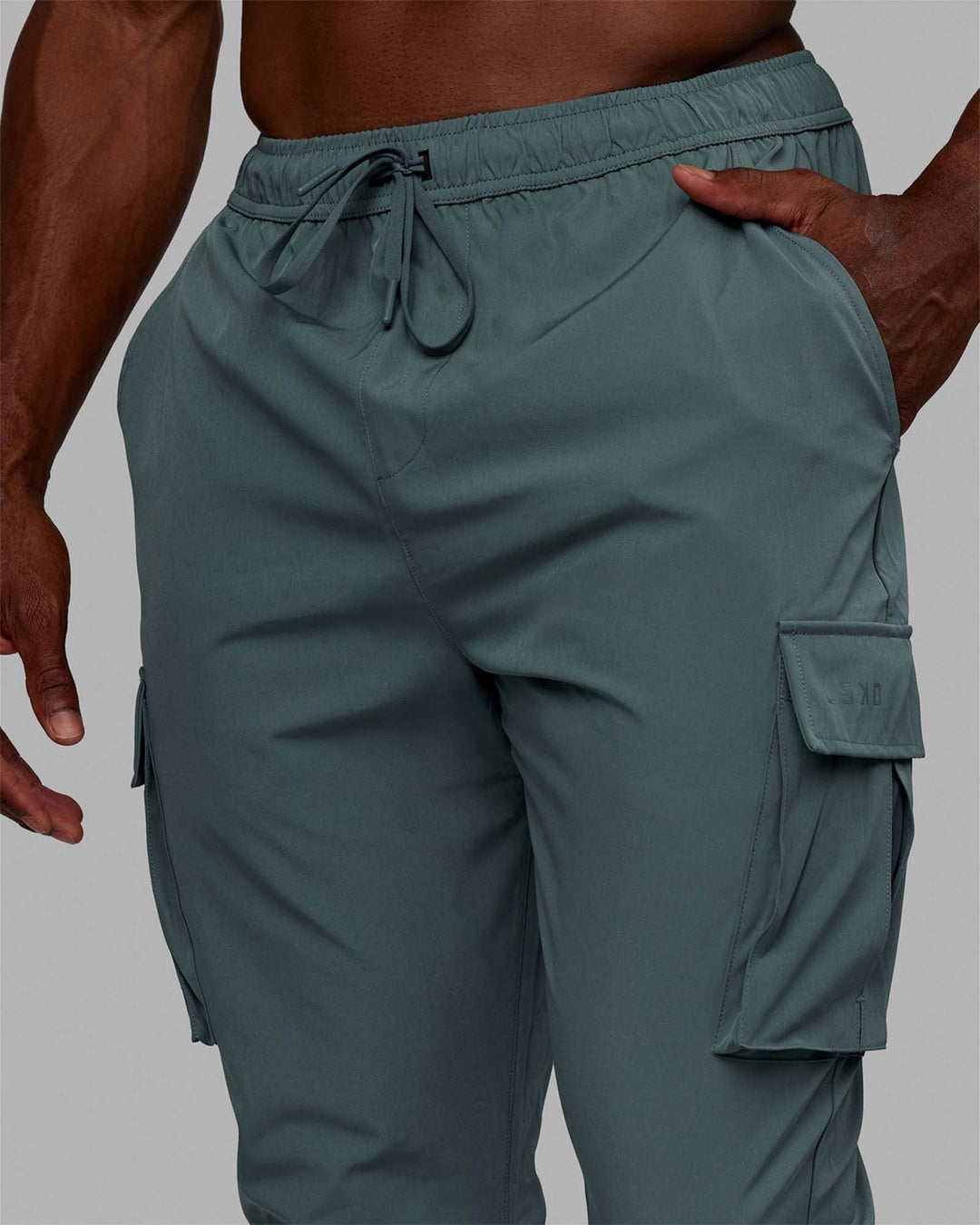 Man wearing Energy Stretch Performance Cargo Joggers - Storm