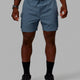 Man wearing Energy Stretch Performance Cargo Shorts - Storm