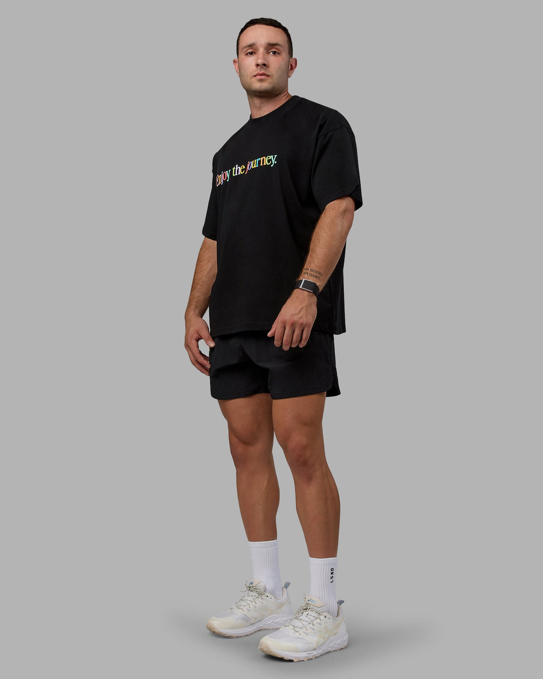 Man wearing Enjoy The Journey 5&quot; Shorts - Black-Multi