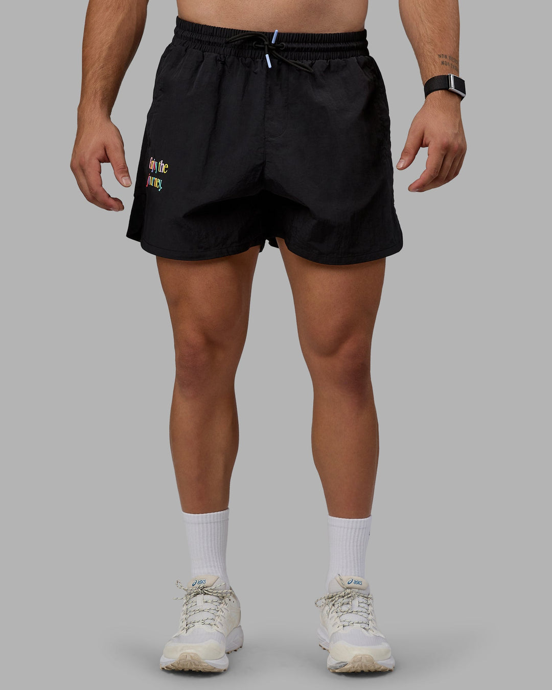 Man wearing Enjoy The Journey 5&quot; Shorts - Black-Multi