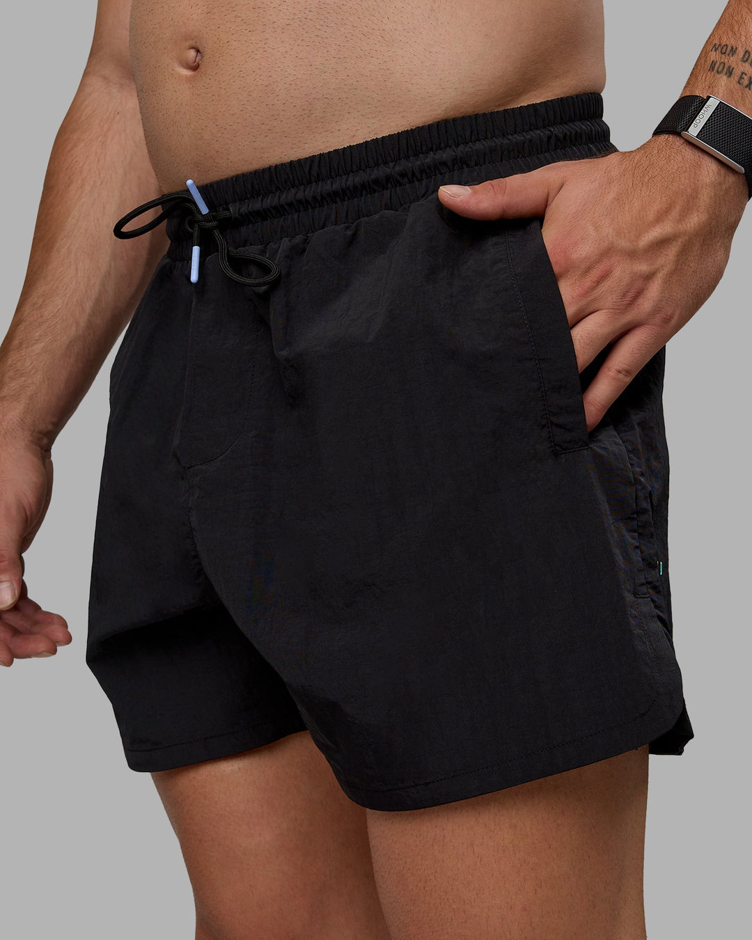 Man wearing Enjoy The Journey 5&quot; Shorts - Black-Multi