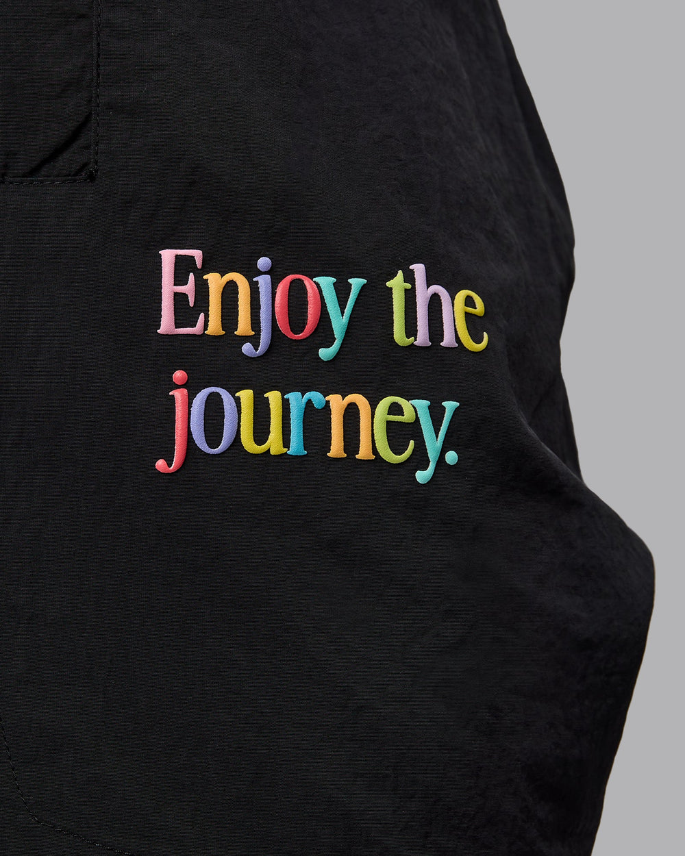 Man wearing Enjoy The Journey 5" Shorts - Black-Multi