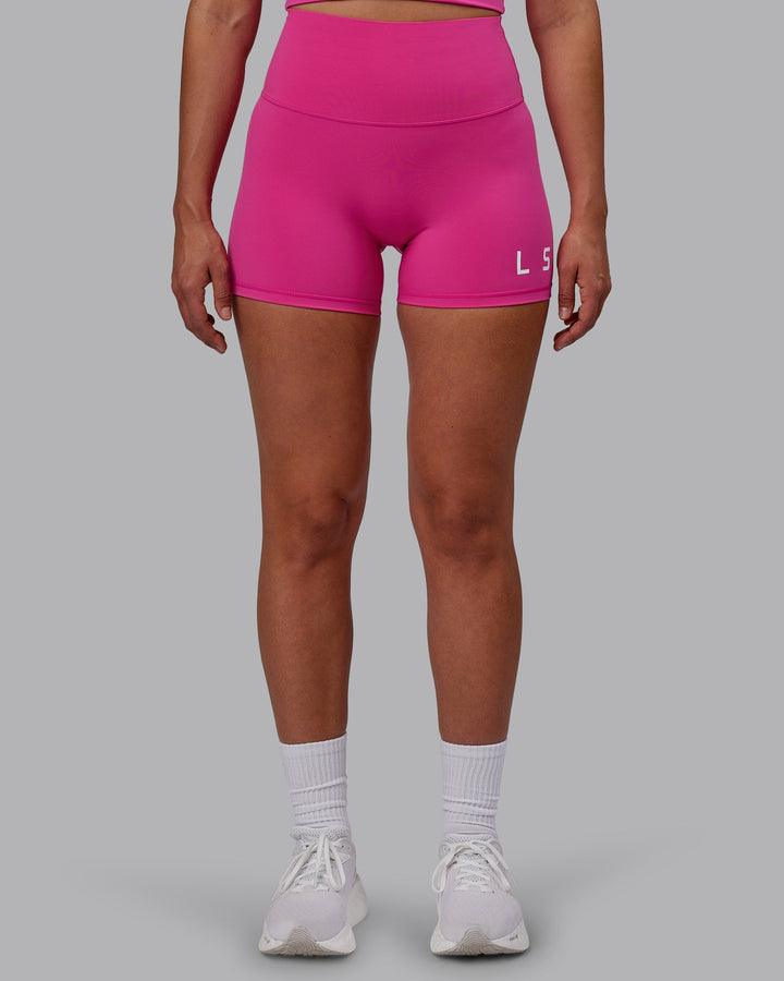 Woman wearing Evolved X-Short Tights - Fuchsia Pink-White
