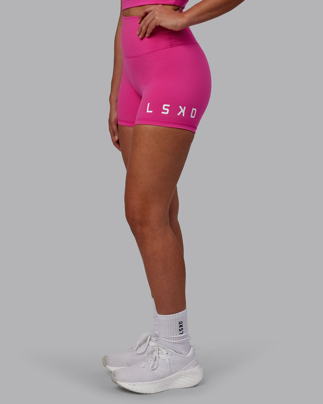 Woman wearing Evolved X-Short Tights - Fuchsia Pink-White