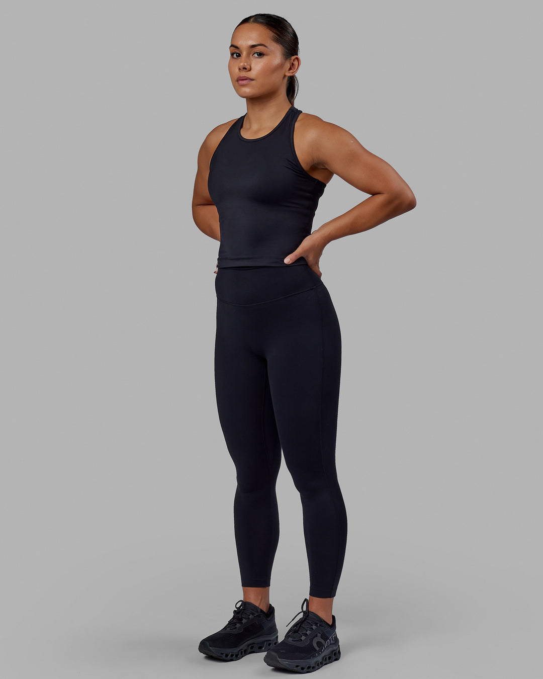Woman wearing Flow Performance Tank - Black | Model:Xantheia | Size:S