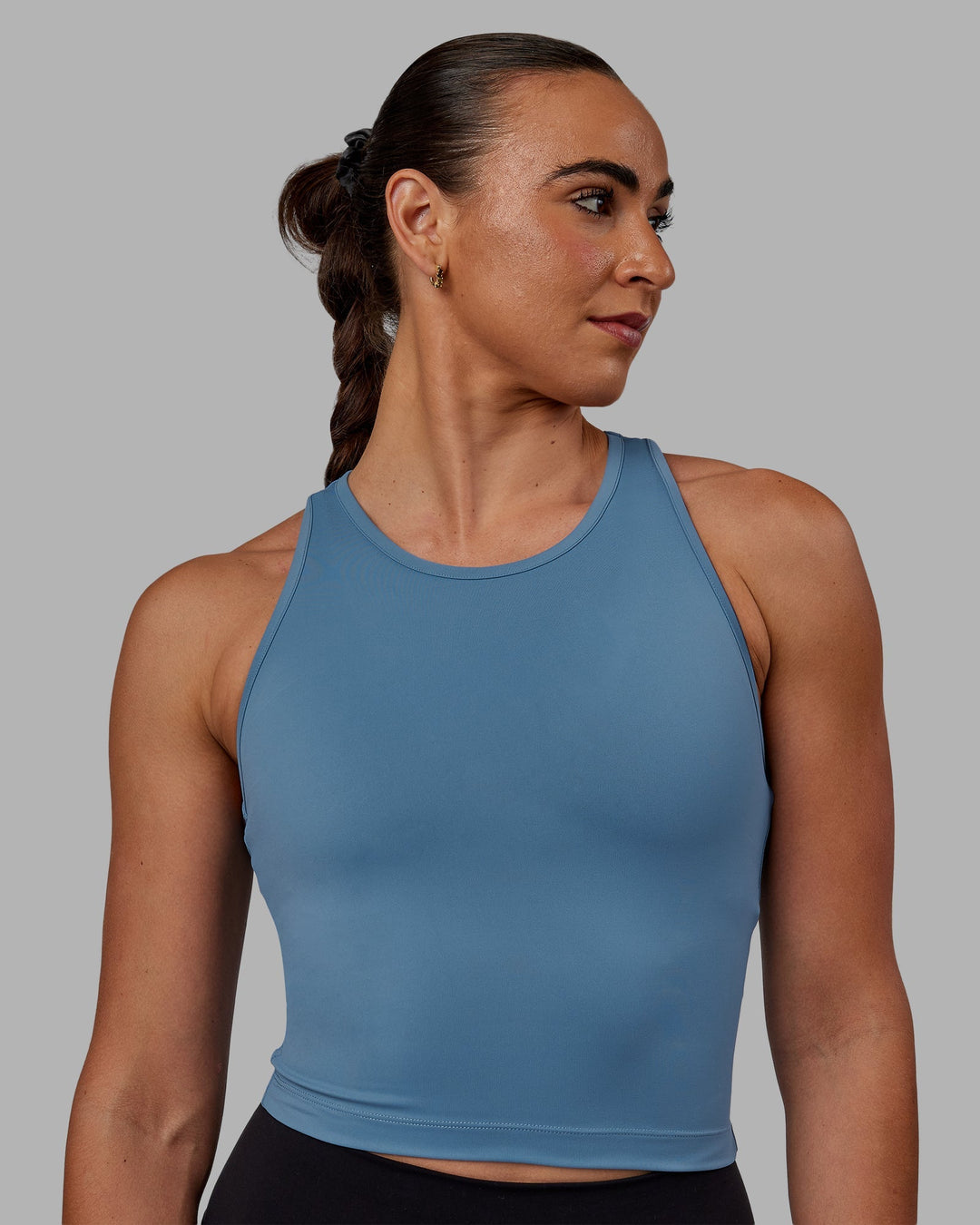 Woman wearing Flow Performance Tank - Elemental Blue