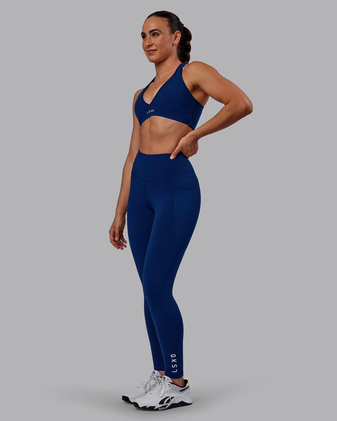 Woman wearing Flux Full Length Leggings - Midnight Blue