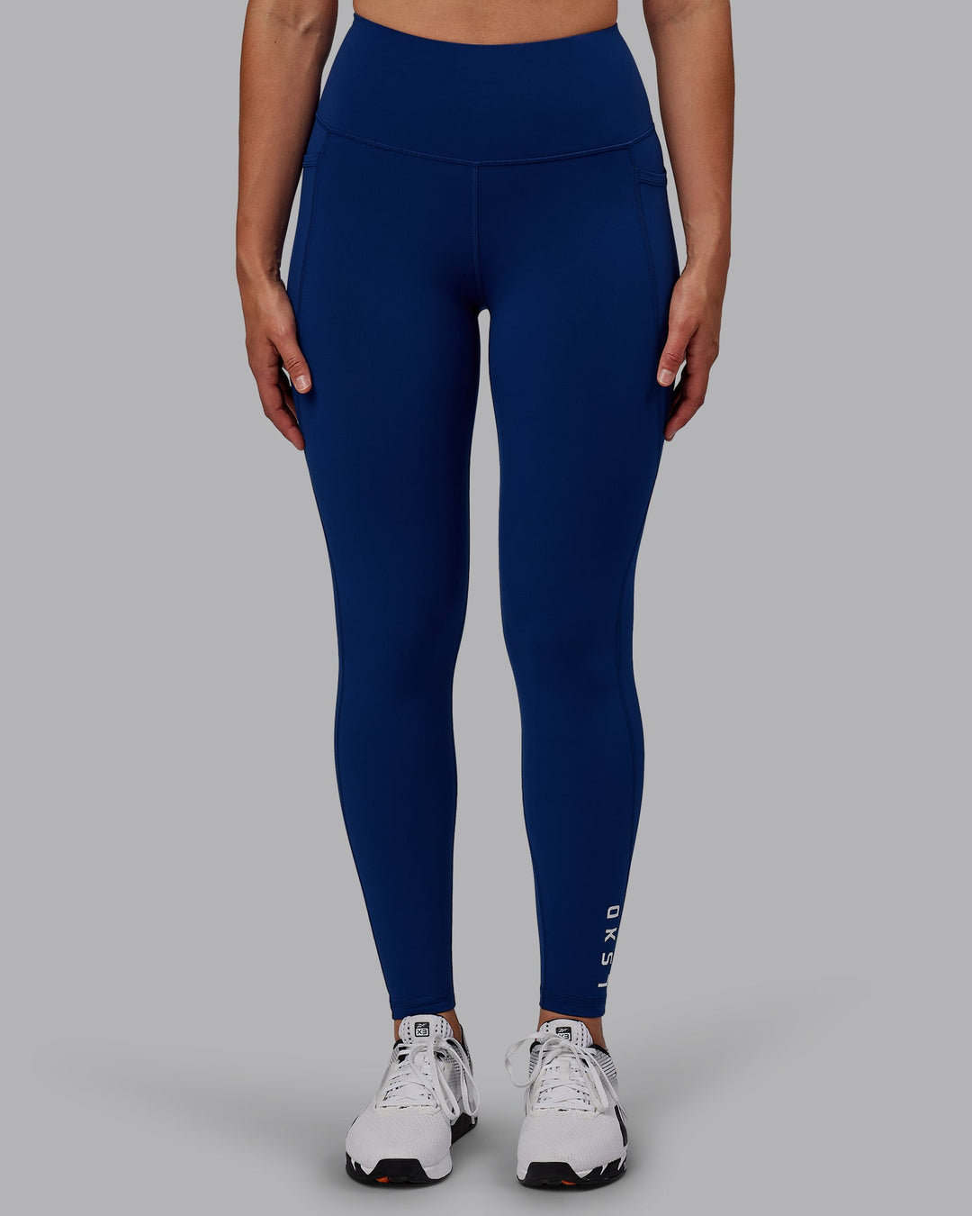 Woman wearing Flux Full Length Leggings - Midnight Blue