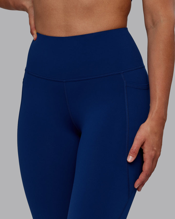 Woman wearing Flux Full Length Leggings - Midnight Blue
