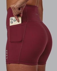Women Wearing Flux Ultra High-Rise 4" Short Pockets - Cranberry