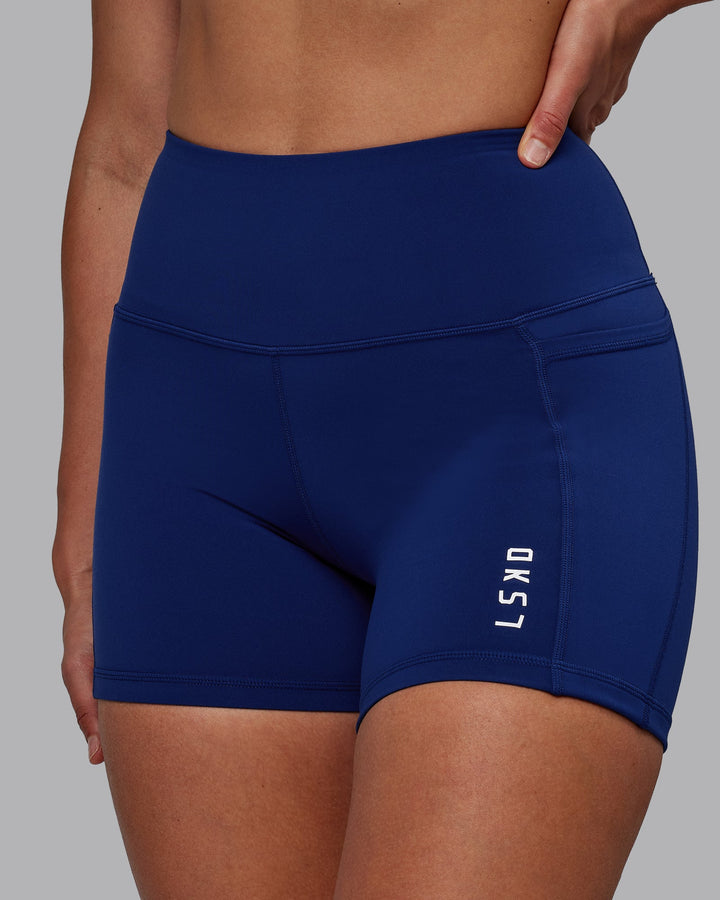 Woman wearing Flux X-Length Shorts - Midnight Blue
