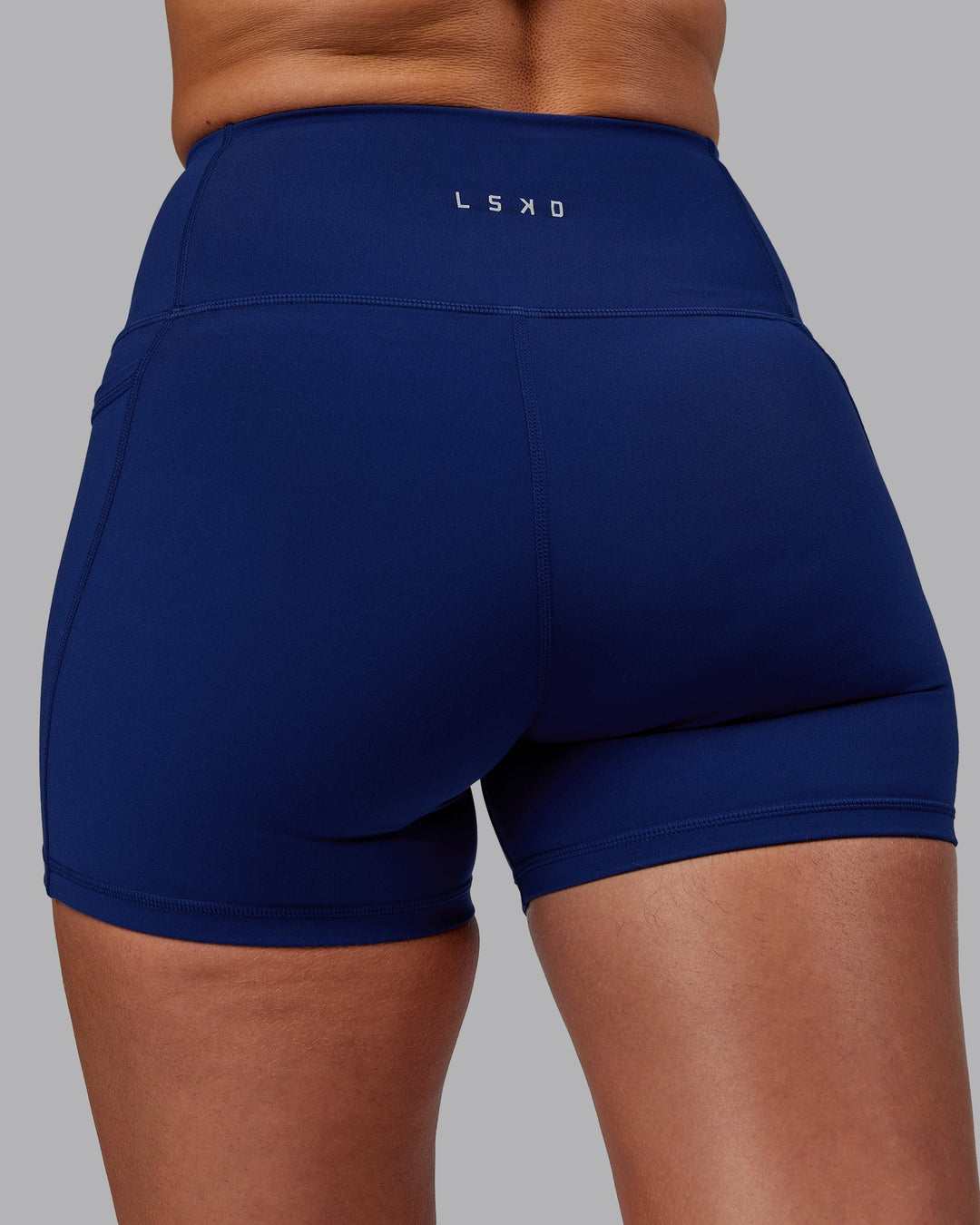 Woman wearing Flux X-Length Shorts - Midnight Blue