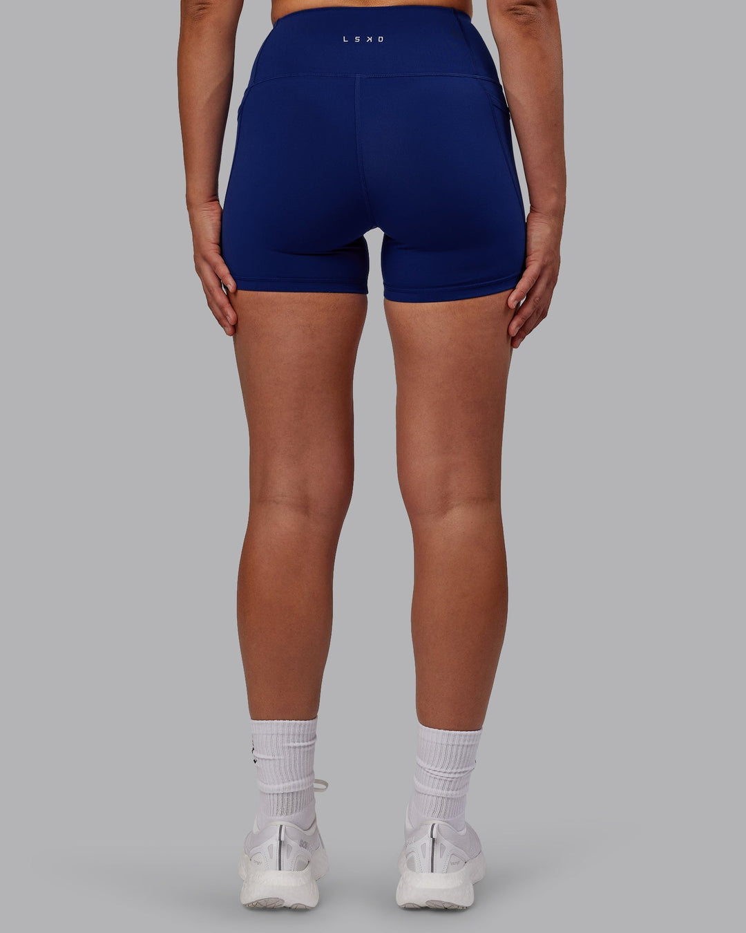 Woman wearing Flux X-Length Shorts - Midnight Blue