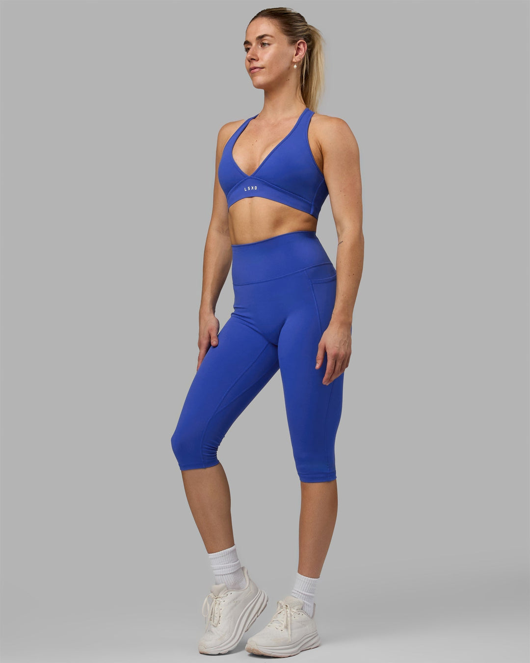 Woman wearing Fusion 3/4 Length Leggings - Power Cobalt