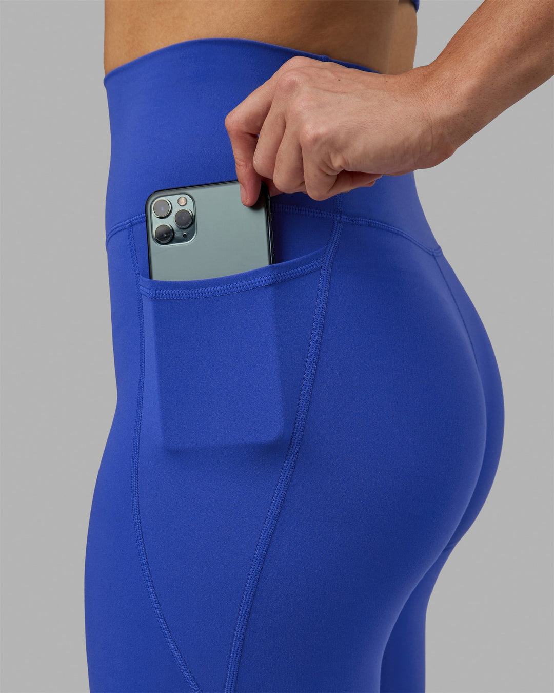 Woman wearing Fusion 3/4 Length Leggings - Power Cobalt