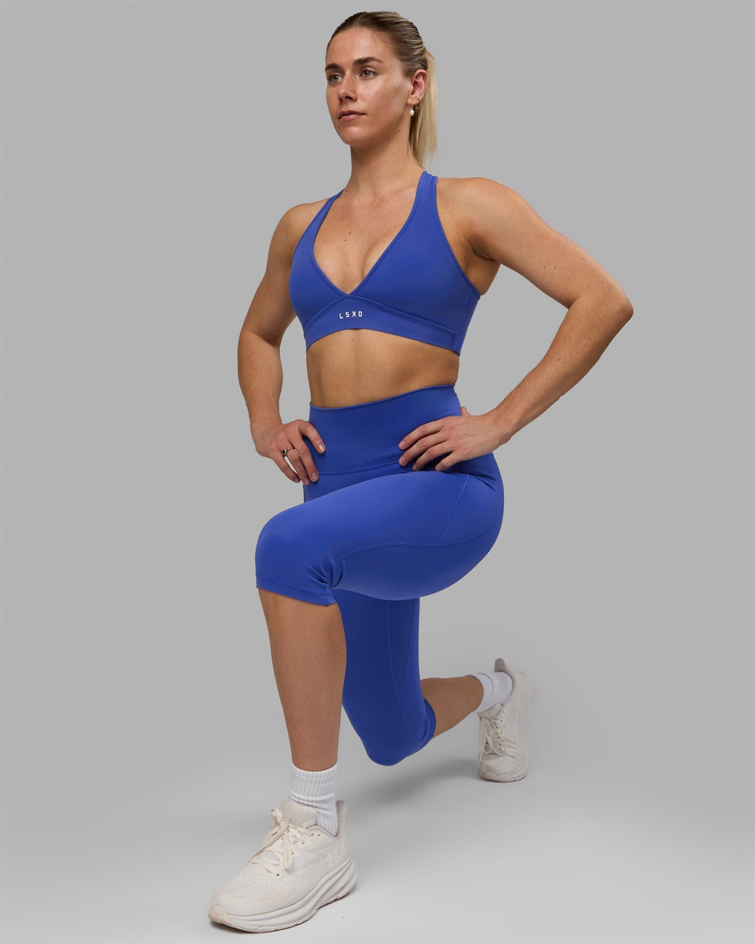 Woman wearing Fusion 3/4 Length Leggings - Power Cobalt