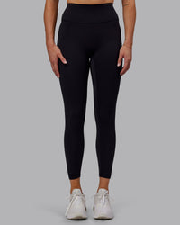 Woman wearing Fusion Ultra High-Rise 7/8 Legging - Black | Model:Hannah | Size:S