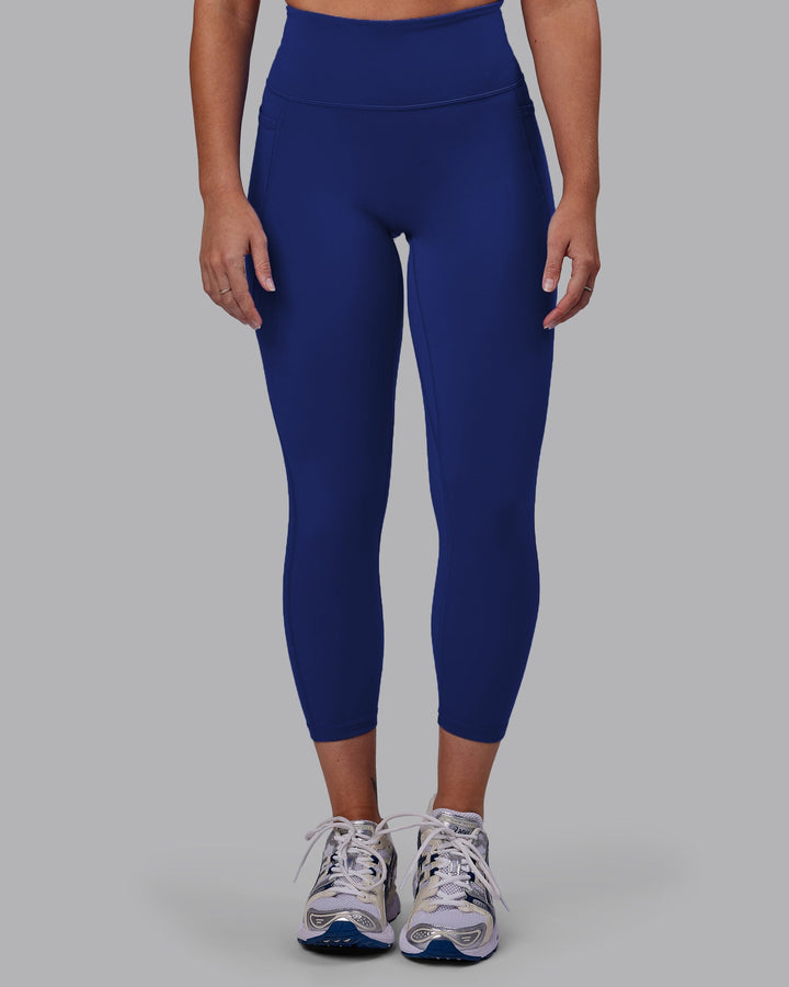 Woman wearing Fusion 7/8 Length Leggings - Midnight Blue
