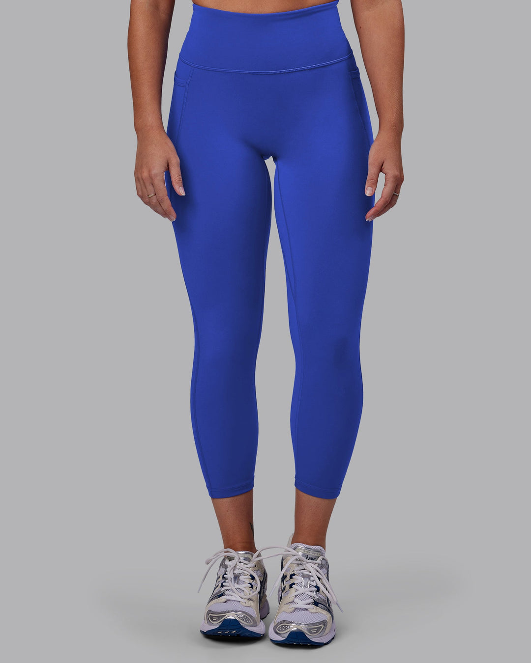 Woman wearing Fusion Ultra High-Rise 7/8 Legging Pockets - Power Cobalt | Model:Hannah | Size:S