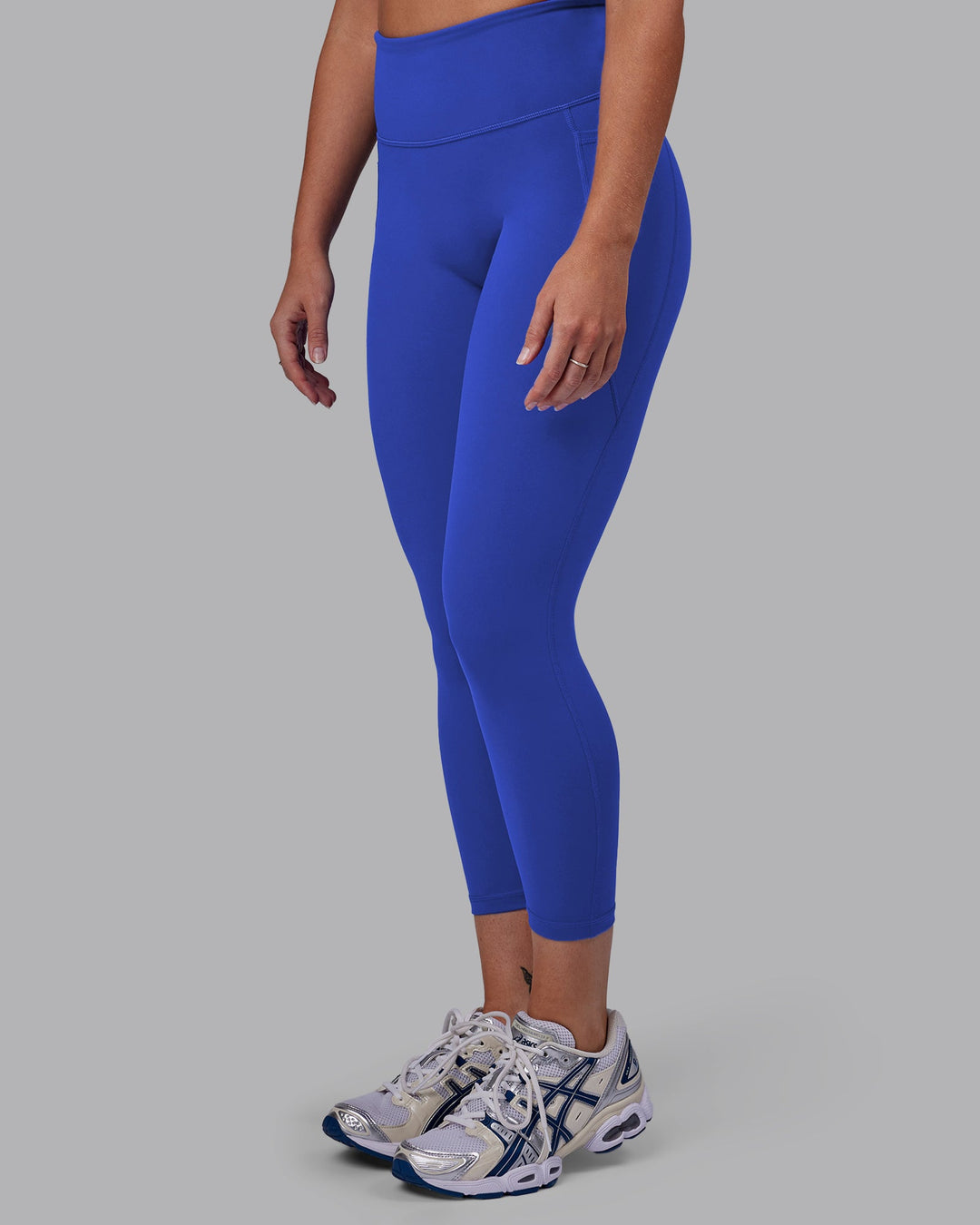 Woman wearing Fusion Ultra High-Rise 7/8 Legging Pockets - Power Cobalt | Model:Hannah | Size:S