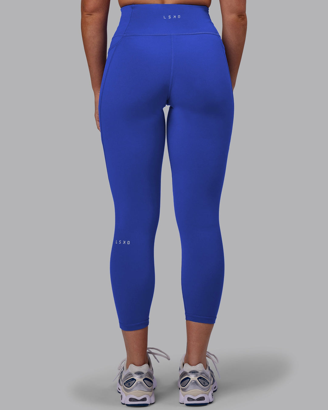 Woman wearing Fusion Ultra High-Rise 7/8 Legging Pockets - Power Cobalt | Model:Hannah | Size:S