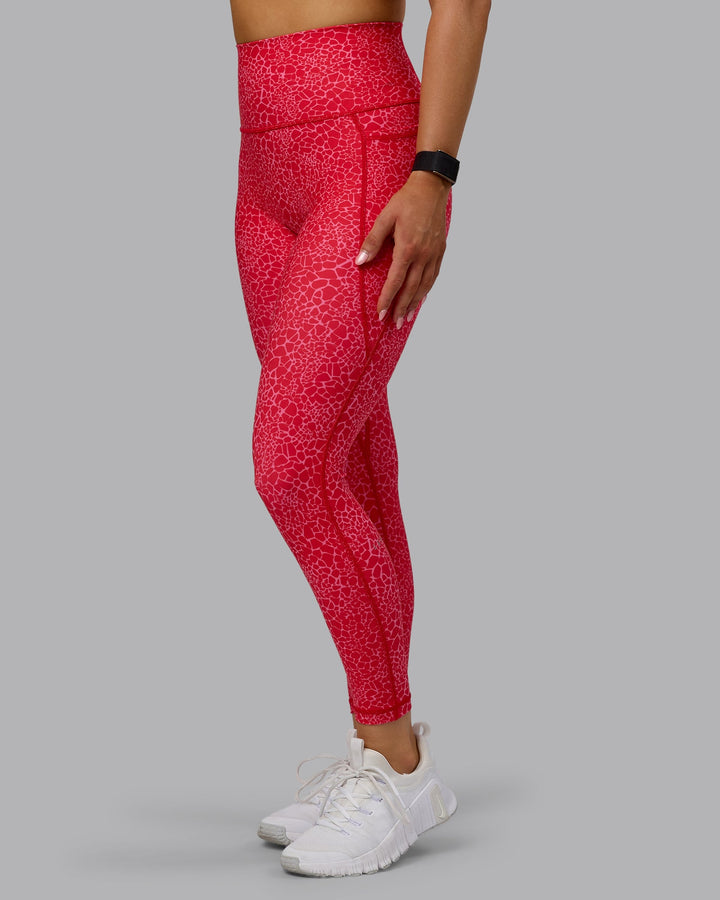 Woman wearing Fusion 7/8 Length Tights - Red Vitality Print
