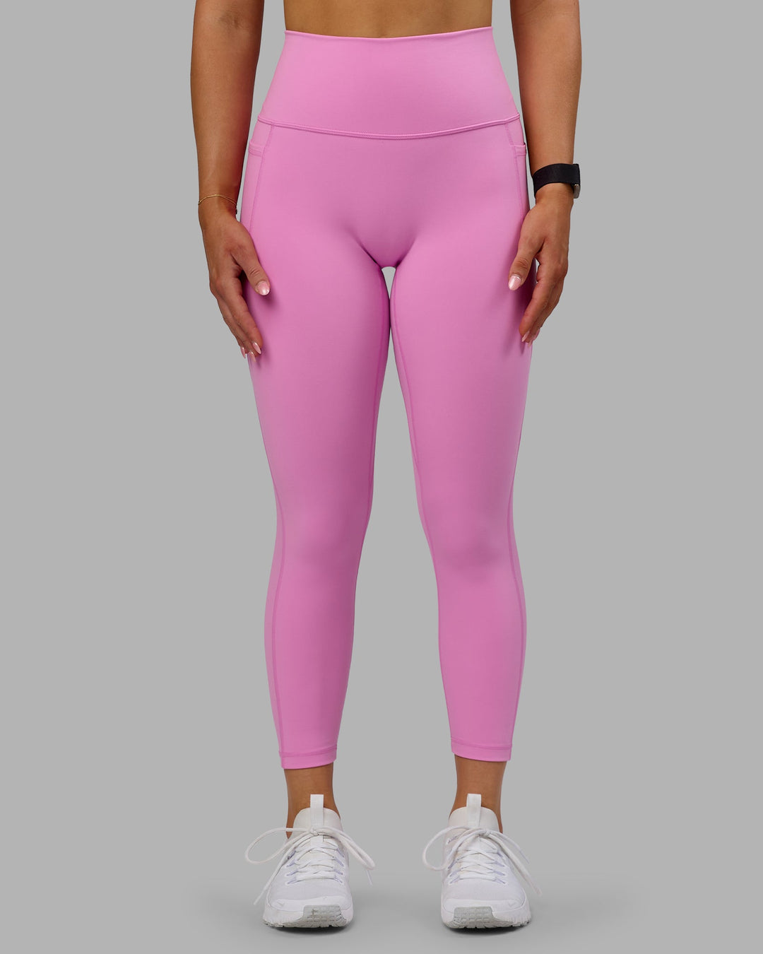 Woman wearing Fusion 7/8 Length Tights - Spark Pink