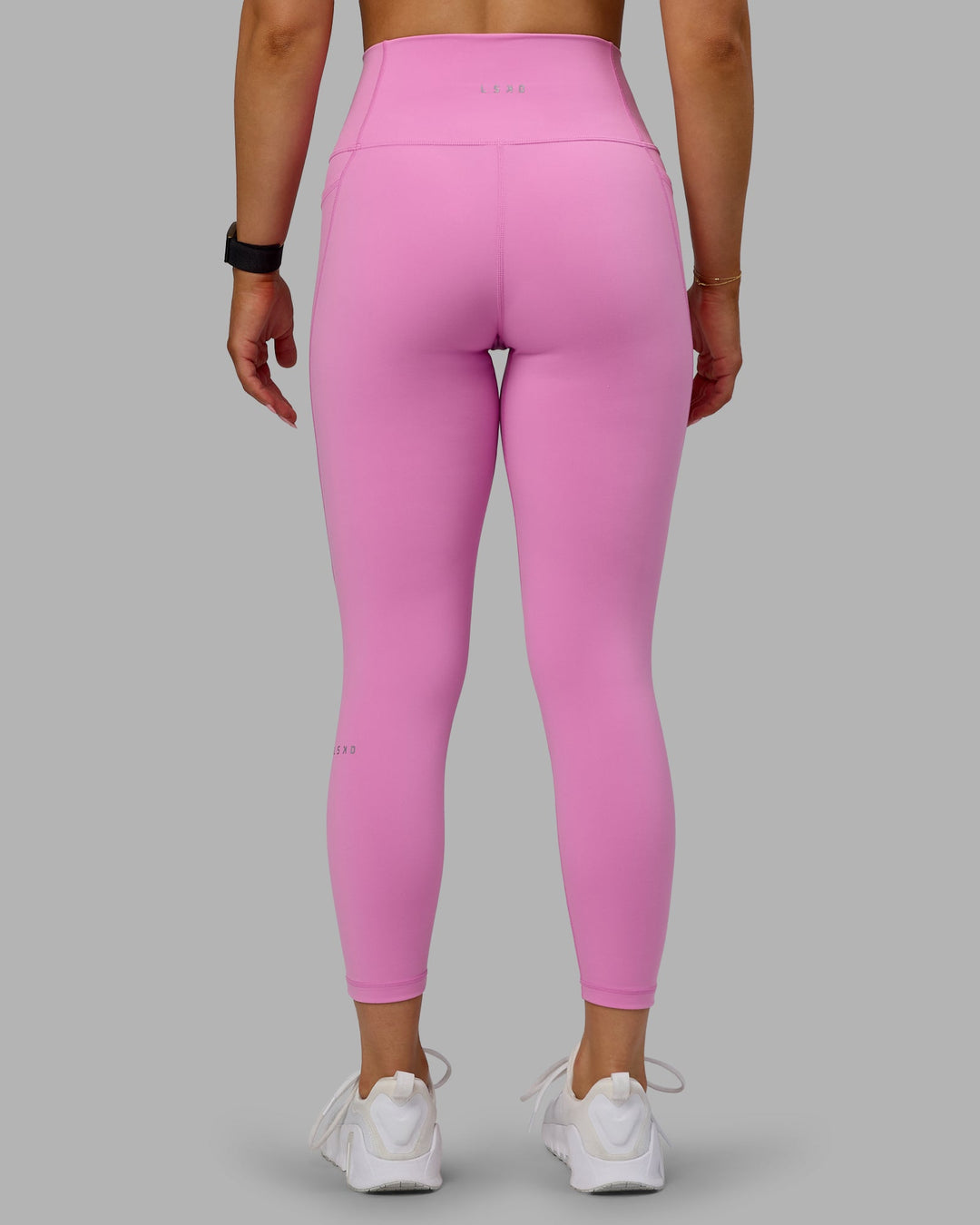 Woman wearing Fusion 7/8 Length Tights - Spark Pink