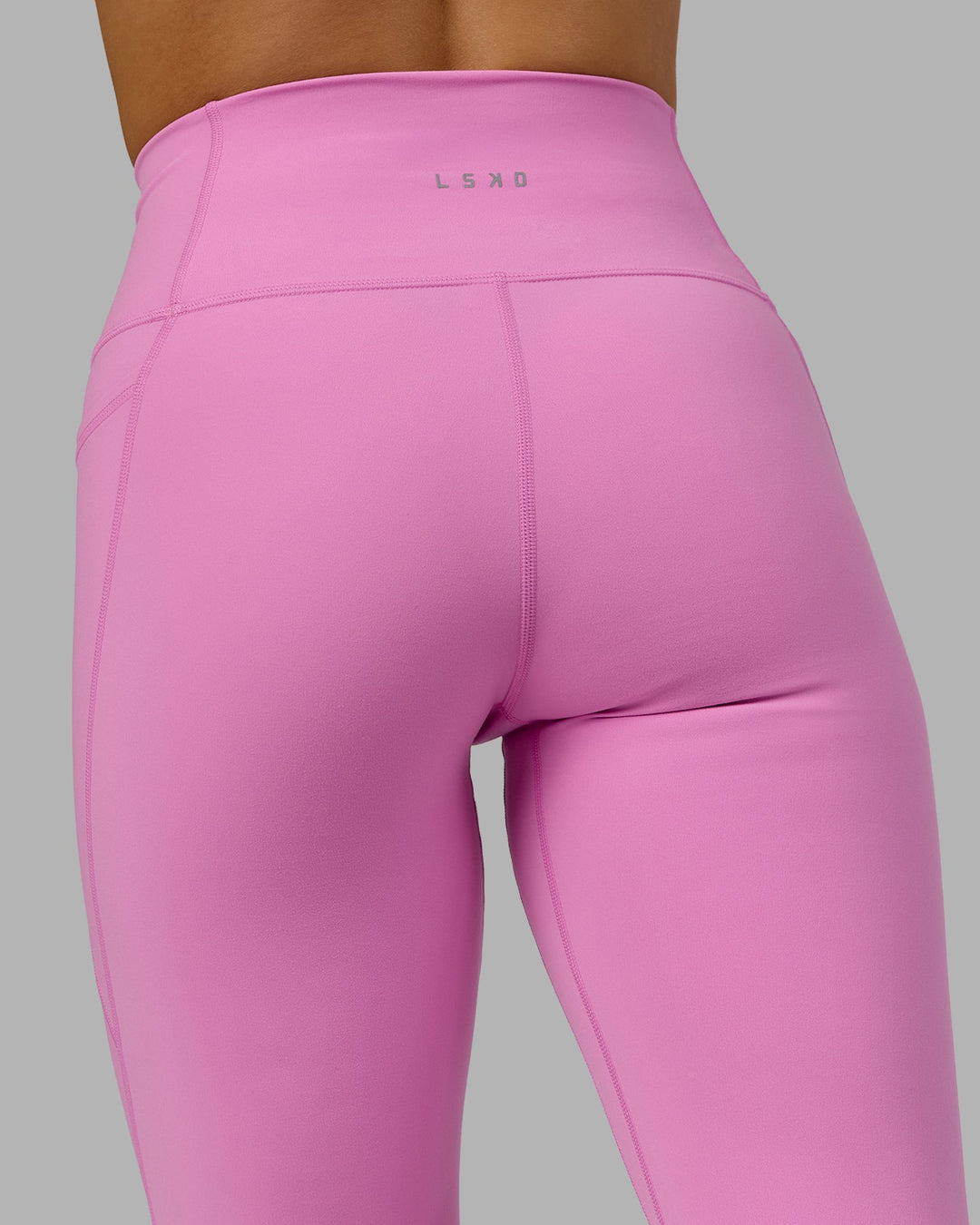 Woman wearing Fusion 7/8 Length Tights - Spark Pink