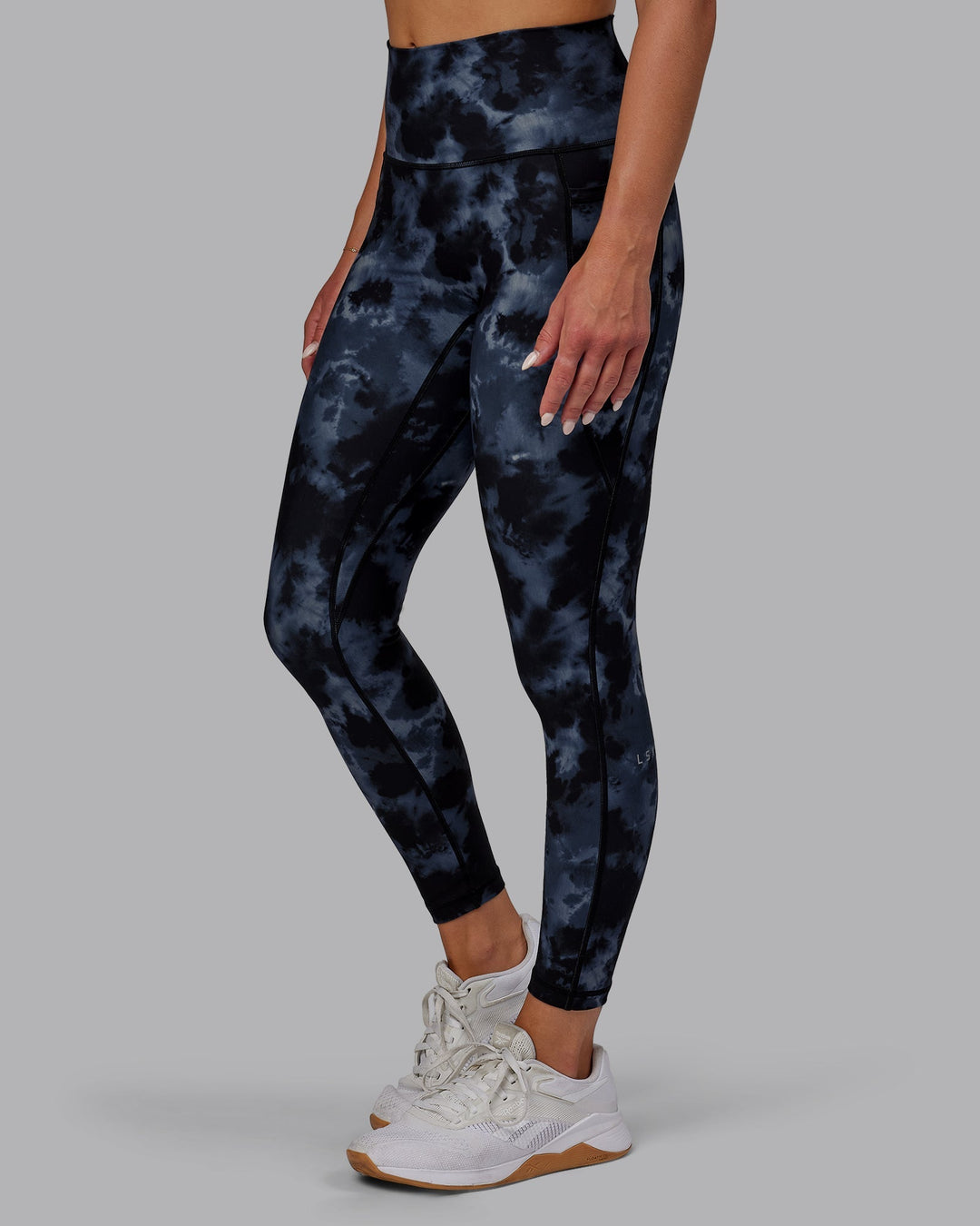 Woman wearing Fusion 7/8 Length Leggings - Tie Dye-Midnight