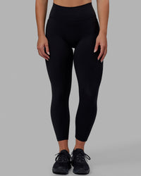 Woman wearing O.G. Fusion Ultra High-Rise 7/8 Legging Pockets - Black | Model:Annabelle | Size:S