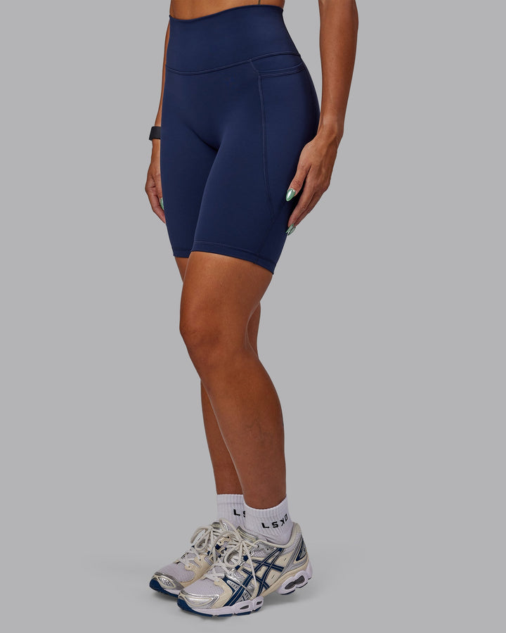 Woman wearing Fusion Bike Shorts with Pockets - Future Navy
