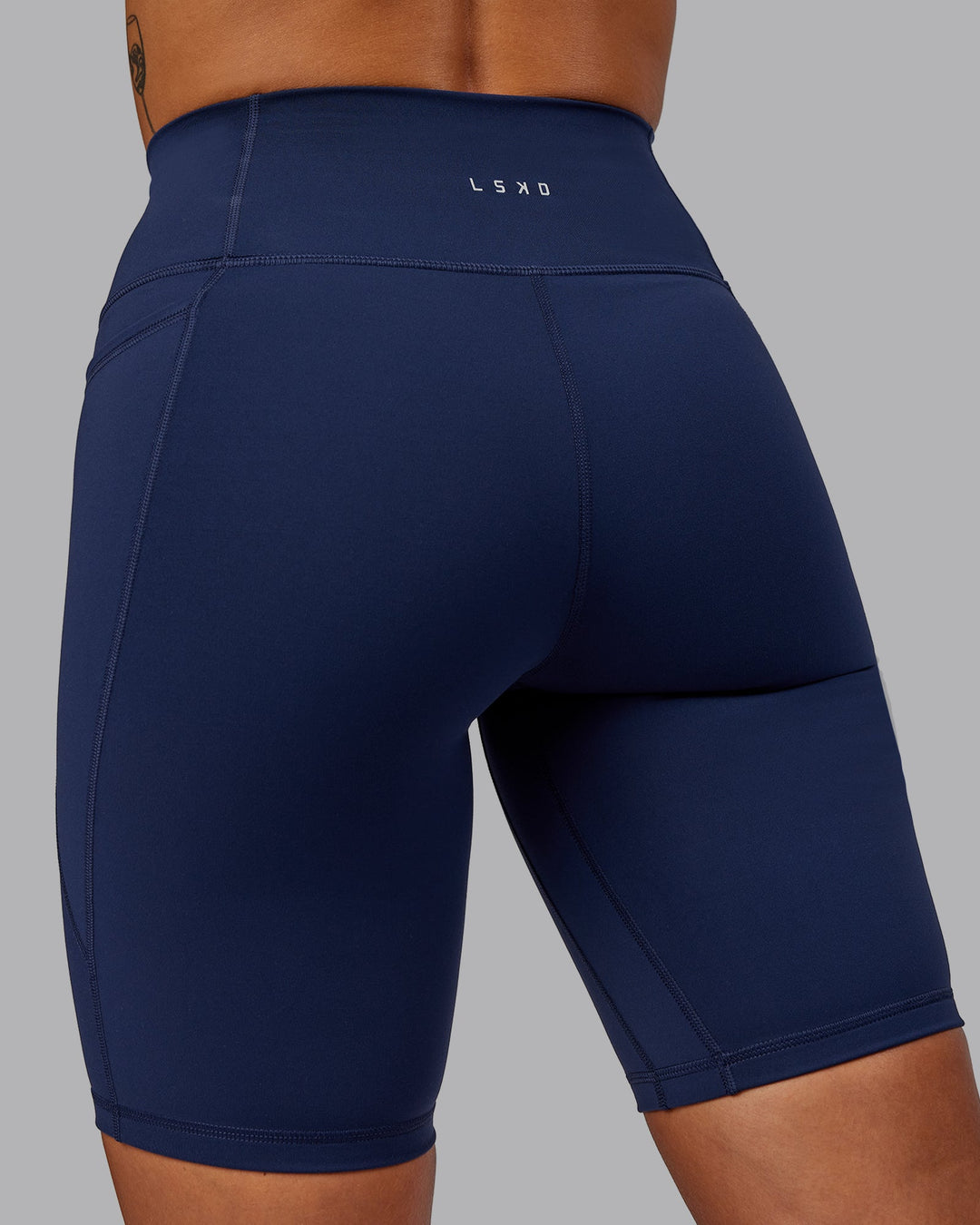 Woman wearing Fusion Bike Shorts with Pockets - Future Navy