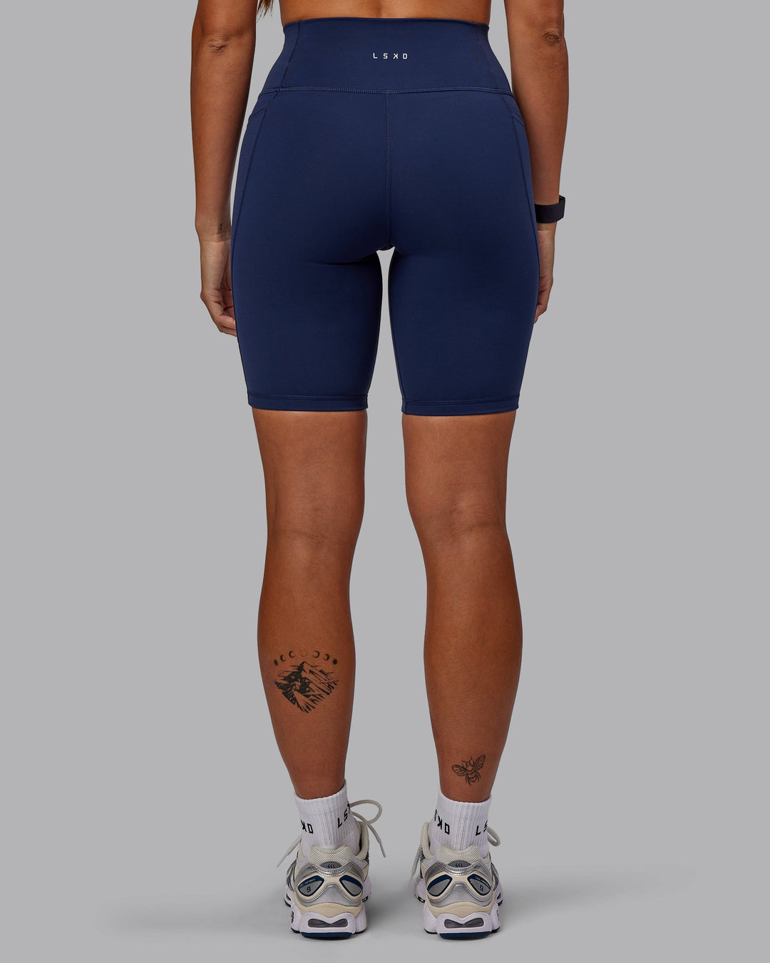 Woman wearing Fusion Bike Shorts with Pockets - Future Navy