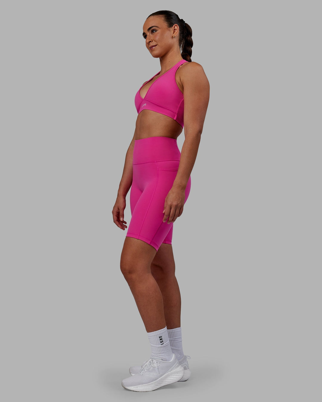 Woman wearing Fusion Bike Shorts - Fuchsia Pink