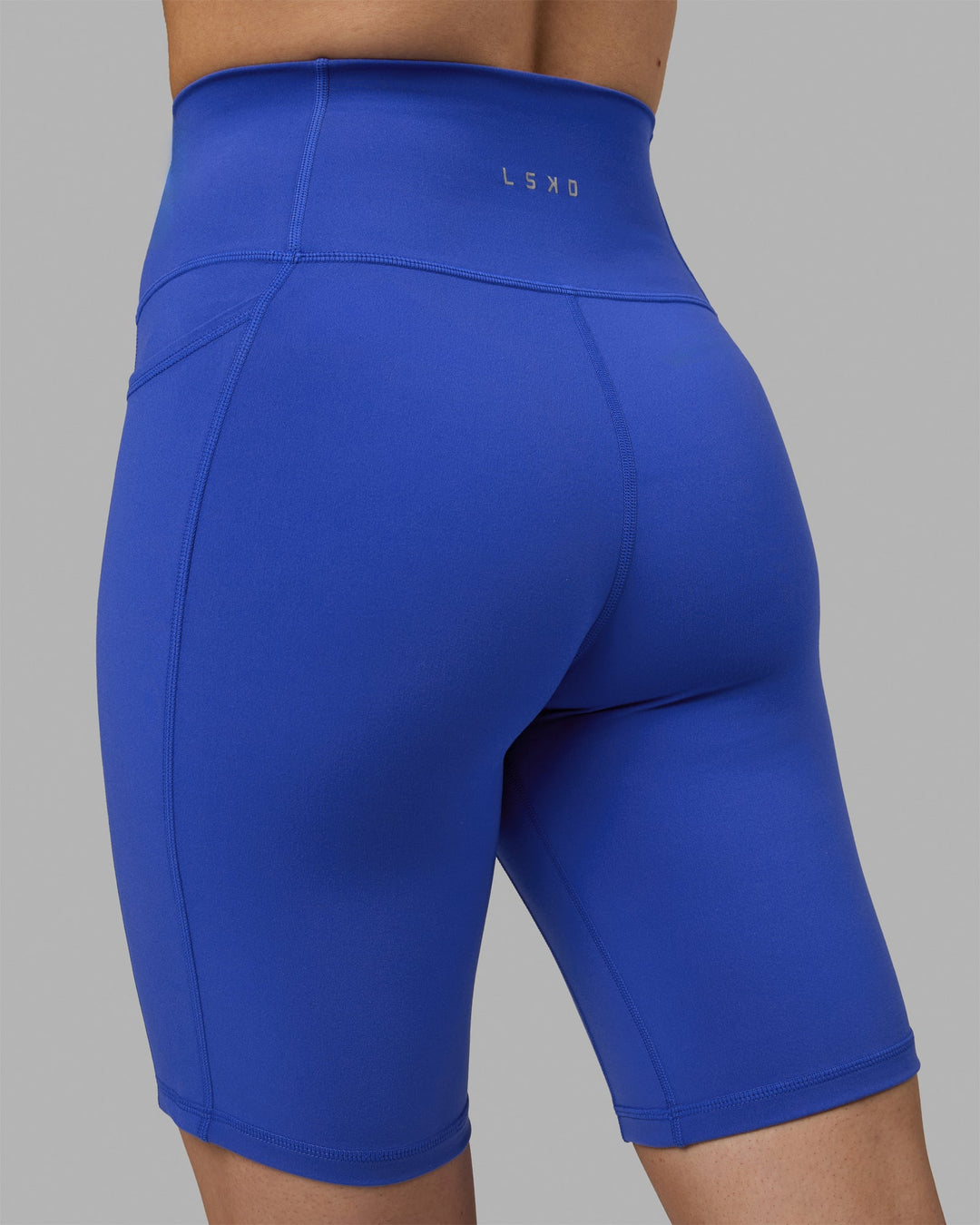 Woman wearing Fusion Bike Shorts - Power Cobalt