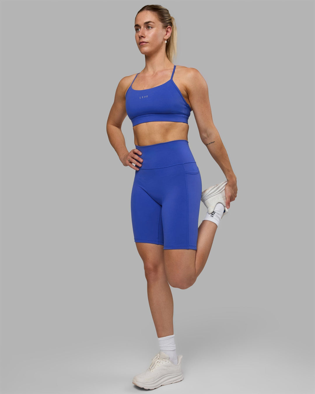 Woman wearing Fusion Bike Shorts - Power Cobalt