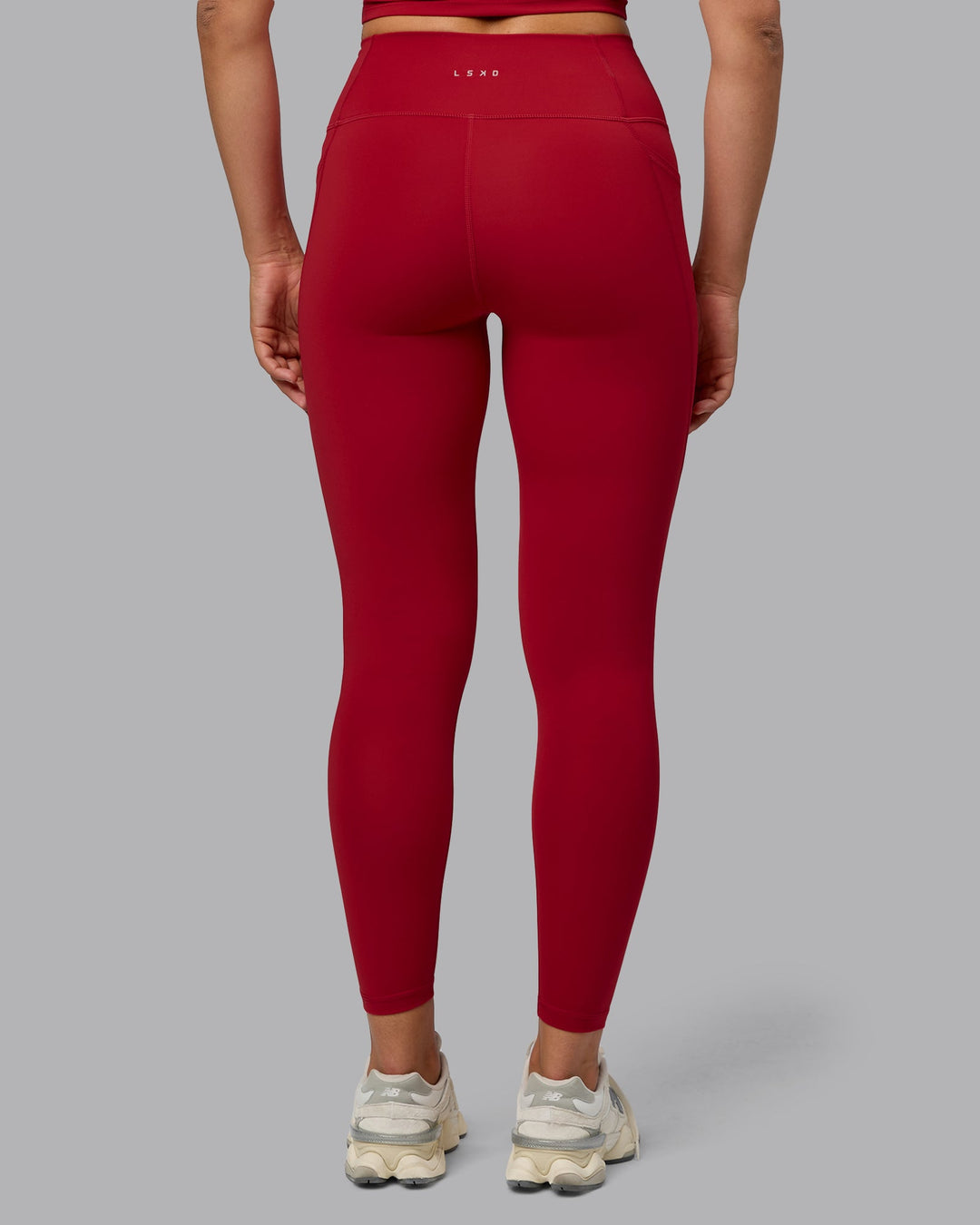 Woman wearing Fusion Full Length Tights with Pockets - Cherry Red