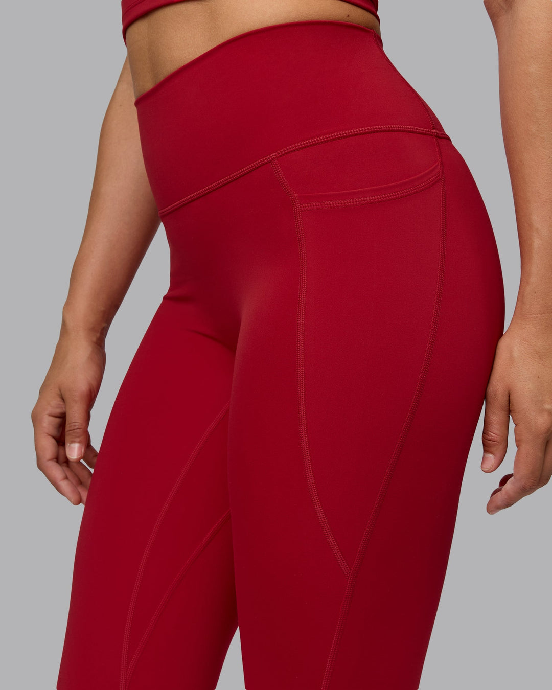 Woman wearing Fusion Full Length Tights with Pockets - Cherry Red