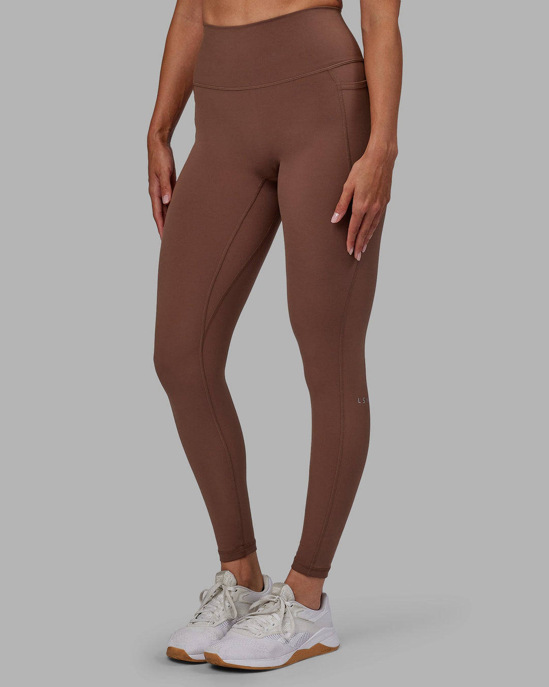 Woman wearing Fusion Full Length Leggings - Dull Rust